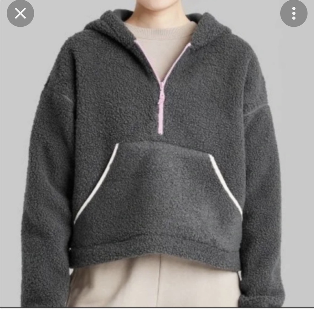Woman’s Sherpa gray pullover jacket.  Size XS.  NWT.  With hood and kangaroo